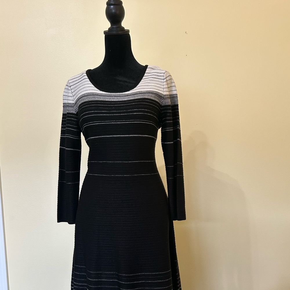 NWOT Nine West Elegant Black and White Knit Dress, size small.